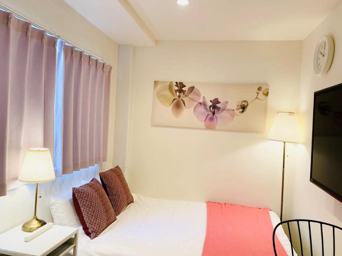 Namba Garden Square Apartment Osaka Esterno foto